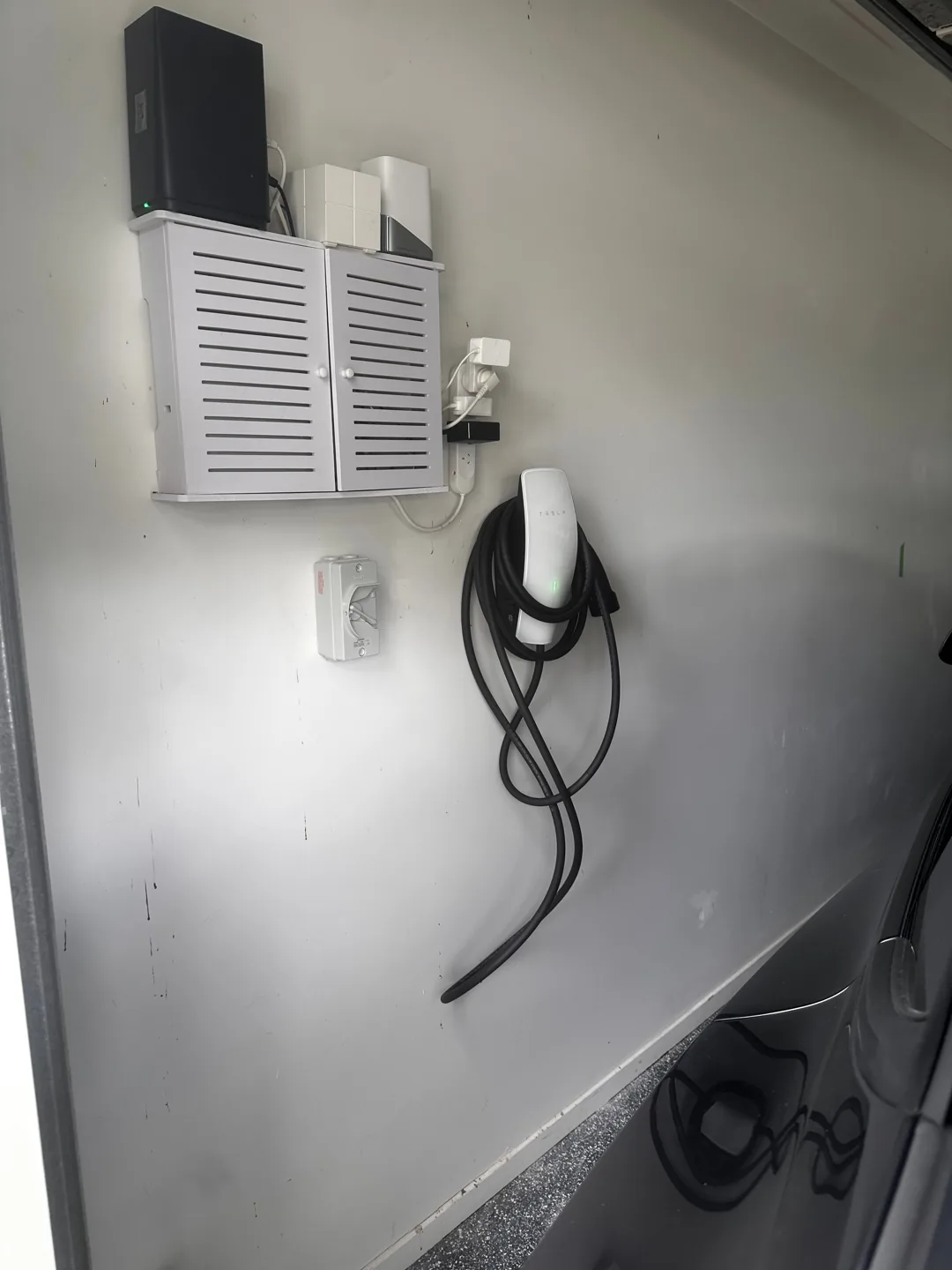Tesla EV charger garage installation
